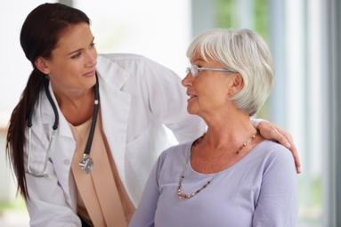 Doctor interacting with an older patient